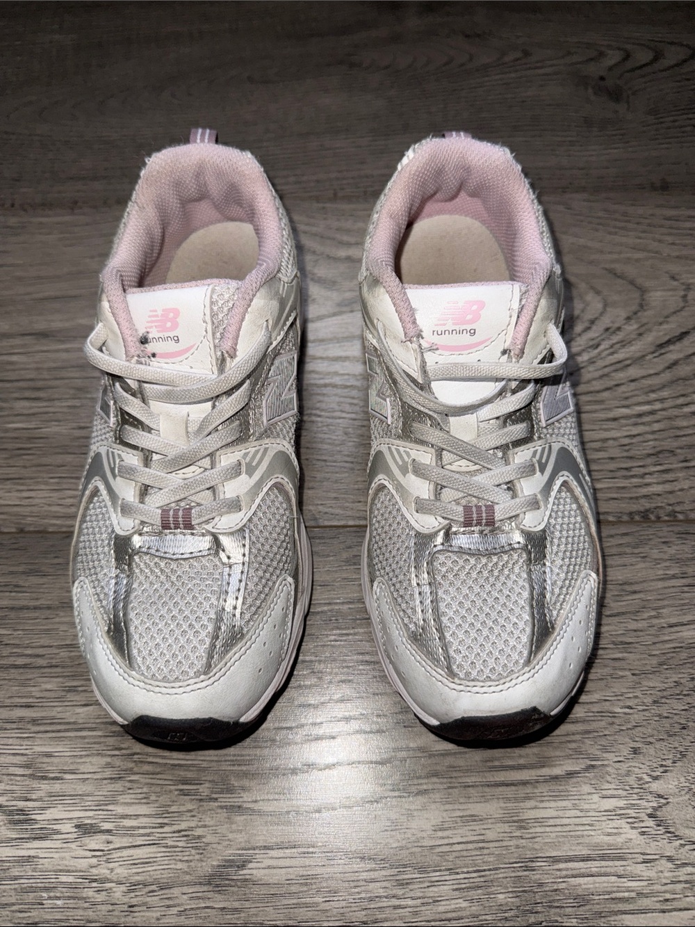 Kids New Balance White and Light Pink Athletic Sneakers